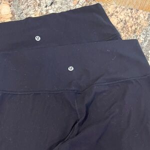 Lululemon Black Align leggings, size 12. 1 pair 25in and other 28in.